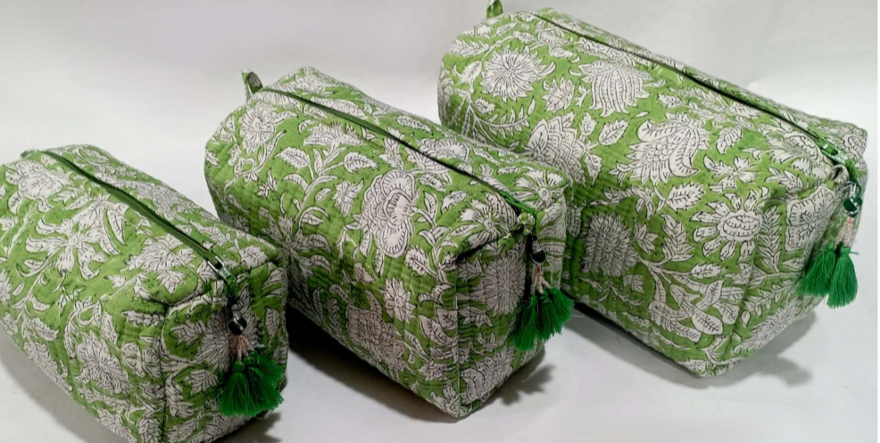 Set of three Verdant Bloom green floral quilted wash bags with zipper closures and tassel details, perfect for travel or everyday use.
